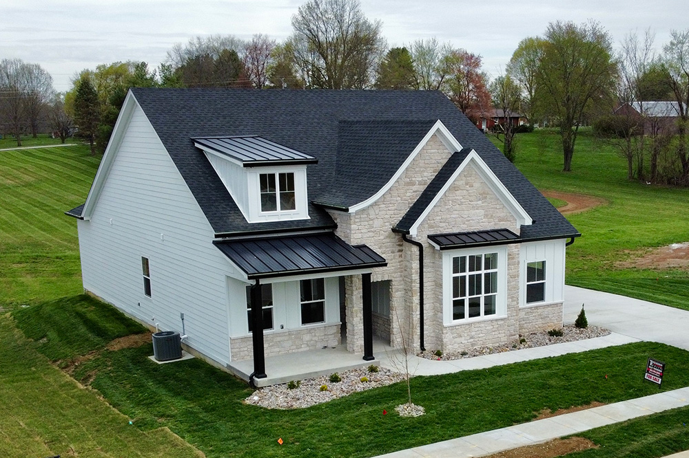 Kentucky home with metal roofing on the dormer