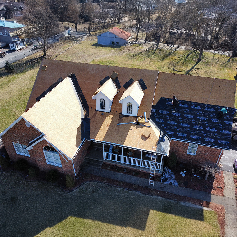 Roofing Replacement or Roofing Repair View of roof with plywood